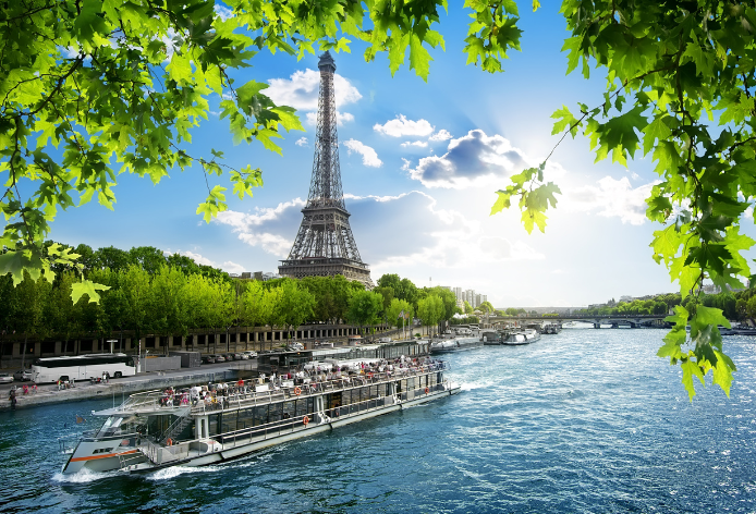 Tour boat on the River Seine in Paris, with the Eiffel Tower in the background