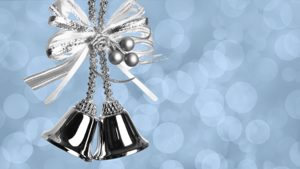 silver bells on sparkling blue background