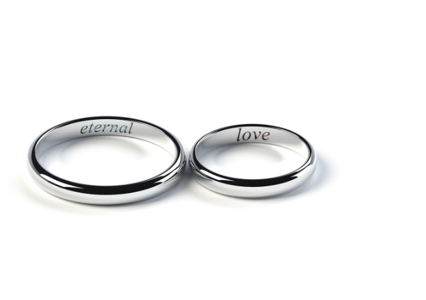 Platinum rings engraved with "eternal love"
